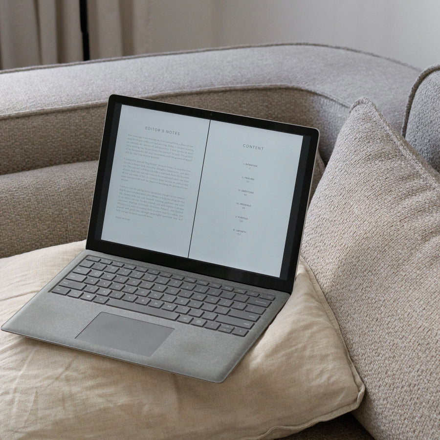 Digital Dig Deeper Journal displaying on laptop
